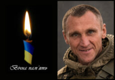 Memorial collage: left, lit candle with Ukrainian flag colors and the text 'Вічна пам'ять'; right, portrait of a smiling soldier in camouflage.