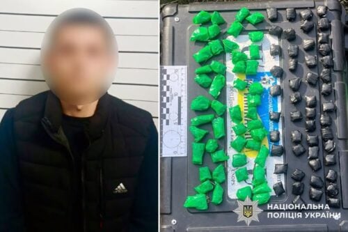 Blurred man in a dark jacket beside a police evidence tray filled with green and black drug packages.